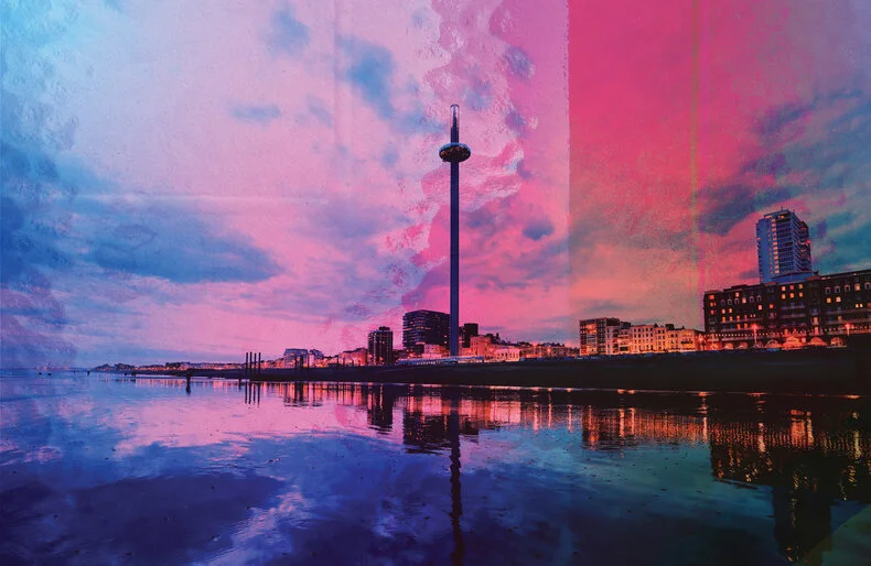 Image of Brighton i360 from the sea with a coloured blue and pink filter over the top